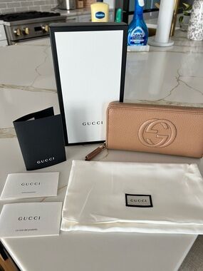Gucci Beige Tan Leather Zip-Around Wallet with Embossed GG